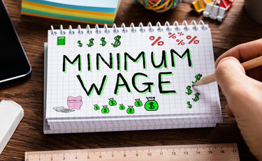 Photo of What Employers Need to Know About the $15.00 Federal Contractor Minimum Wage